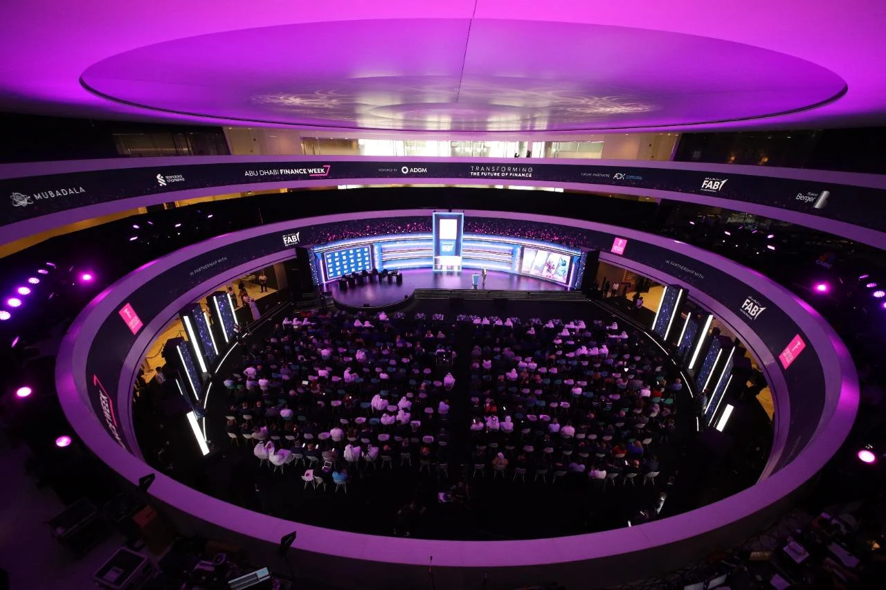 Purple-lit auditorium prepared for Abu Dhabi Finance Week